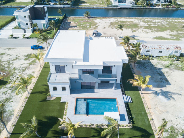CRYSTAL HARBOUR CANAL FRONT HOME - MARQUISE - POOL, ELEVATOR & OUTDOOR KITCHEN CRYSTAL HARBOUR CANAL FRONT HOME - MARQUISE - POOL, ELEVATOR & OUTDOOR KITCHEN